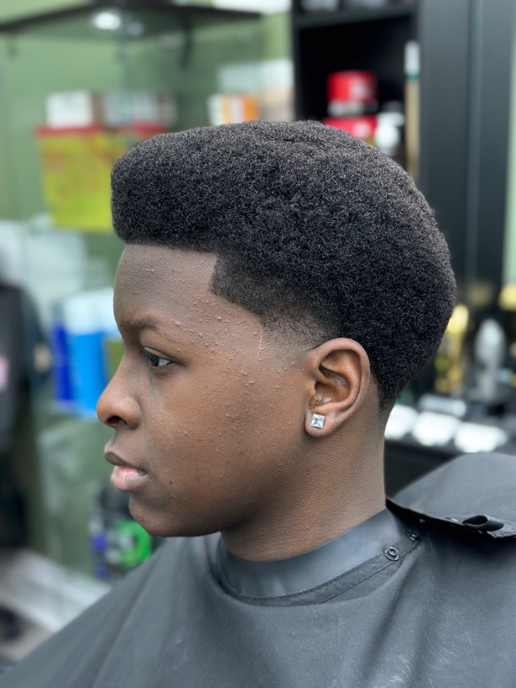 Box afro high-top with knife-sharp lineup and taper