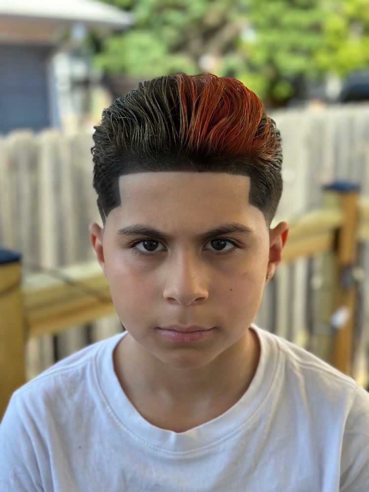 Kids textured pompadour with red-tipped color and crisp lineup