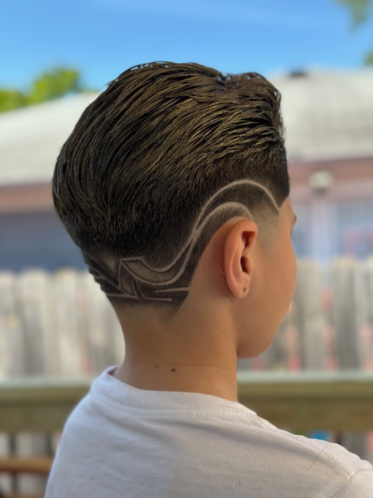 Freehand swirl hair art design over a skin fade